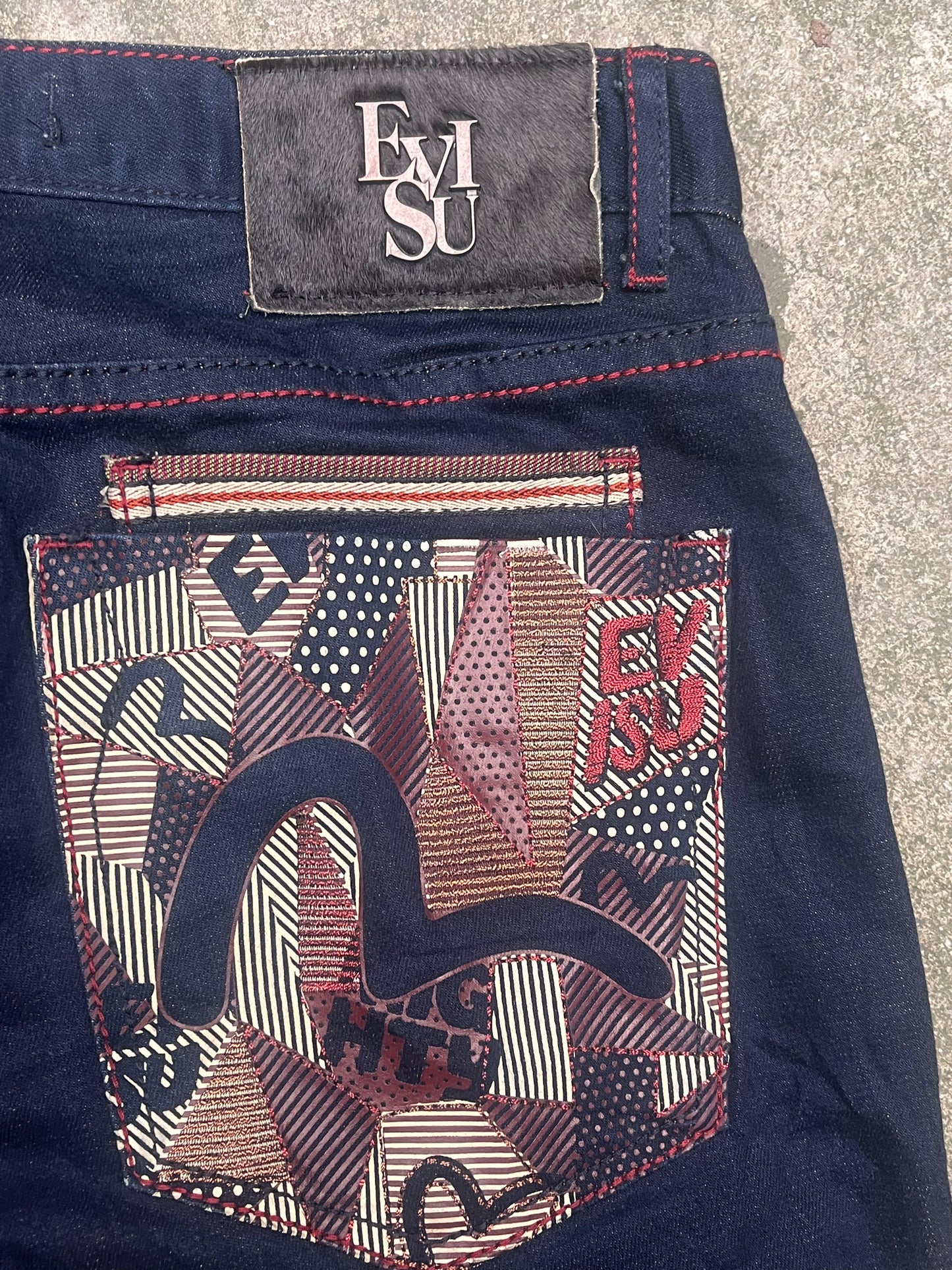 Evisu camo print slim jeans