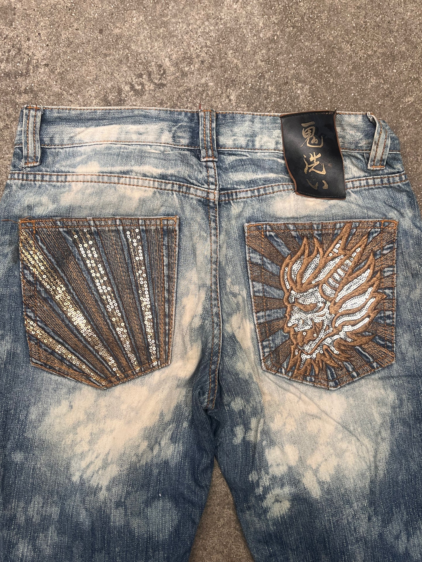 Oniarai Baggy shiny logo jeans