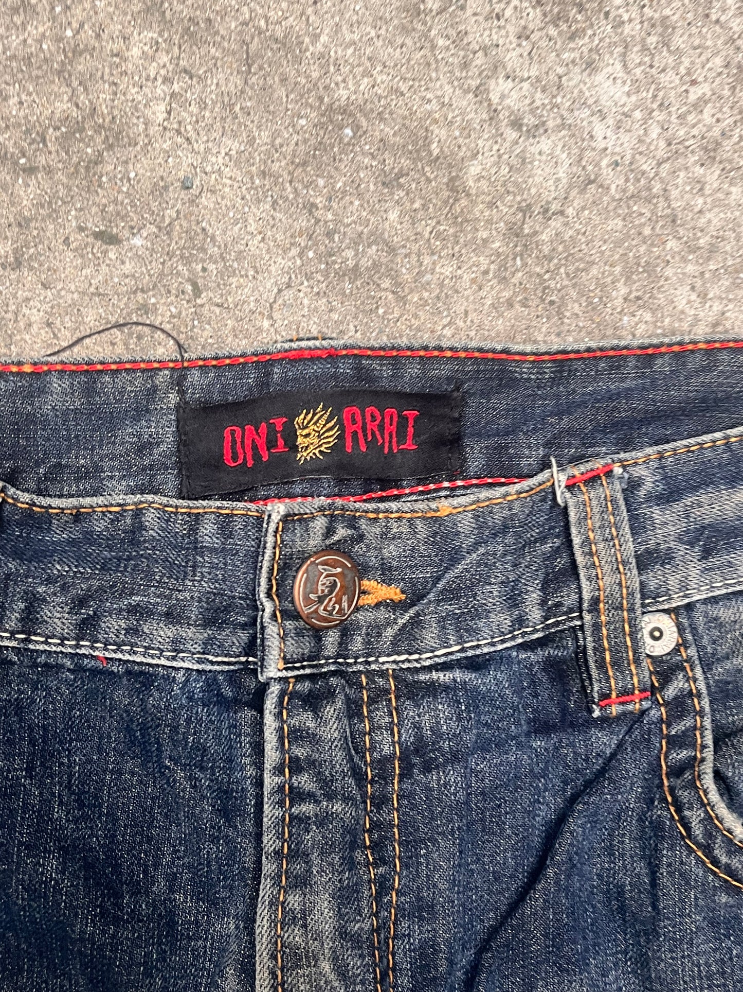 Oniarai Red Demon embroidered jeans